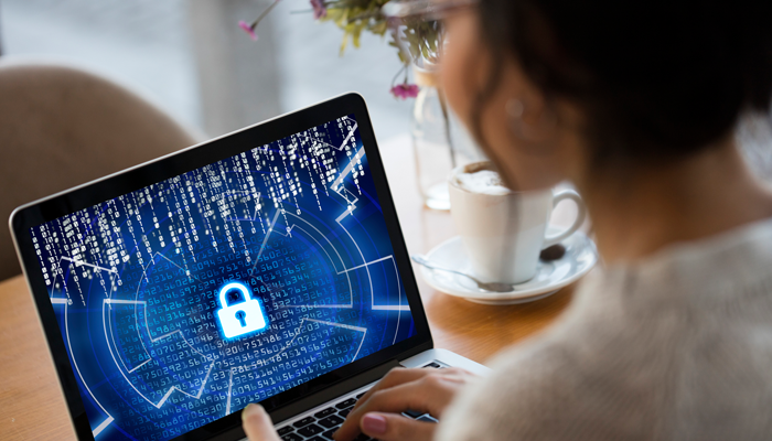 woman holding a tablet with a blue screen digital lock in center indicating a right to privacy