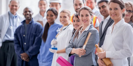 group of different professionals from different industries smiling showcasing current job opportunities in canada