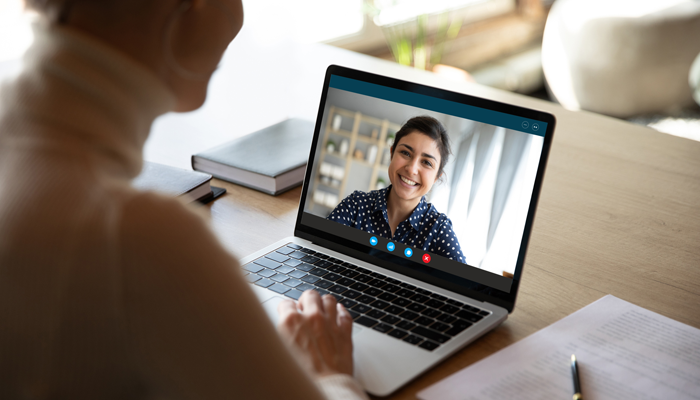 young woman prepared for a remote interview conducted by a woman professional on a virtual interview