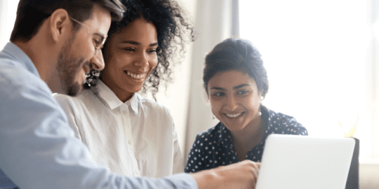 3 professionals overlooking canadian background checks on a laptop screen