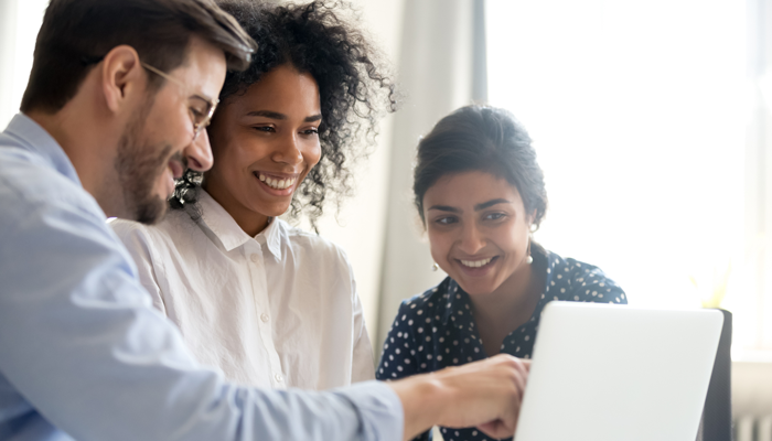 3 professionals overlooking canadian background checks on a laptop screen