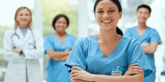 image of 3 blurred out nurses and doctors with hands crossed and one close up of female nurse smiling with hands crossed