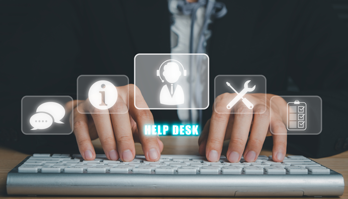 Digital employment screening help desk with icons over a keyboard