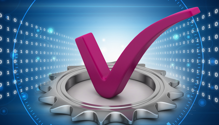 big pink checkmark in center of silver cogwheel with digital background
