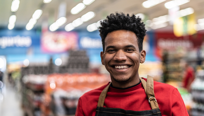 young african american man working in retail for holiday job opportunities